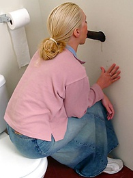 CumCommandos presents: Blonde girl Jamie sits on the toilet and blows a black gloryhole dong